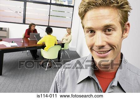 Businesspeople in meeting View Large Photo Image Stock Image - Businesspeople in meeting. Fotosearch