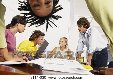 Businesspeople in meeting View Large Photo Image Stock Image - Businesspeople in meeting. Fotosearch