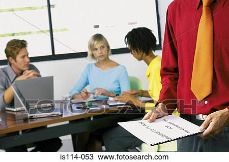 Stock Image - Businesspeople in meeting. Fotosearch