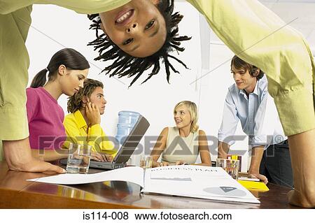 Businesspeople in meeting View Large Photo Image Stock Photo - Businesspeople in meeting. Fotosearch