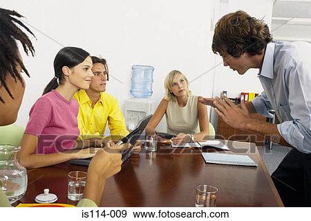 Businesspeople in meeting View Large Photo Image Stock Photo - Businesspeople in meeting. Fotosearch