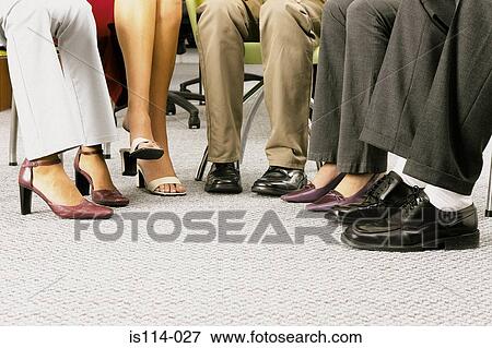 Stock Photo - Businesspeople in meeting. Fotosearch