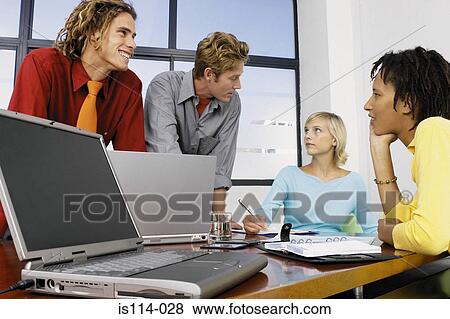 Businesspeople in meeting View Large Photo Image Stock Photo - Businesspeople in meeting. Fotosearch