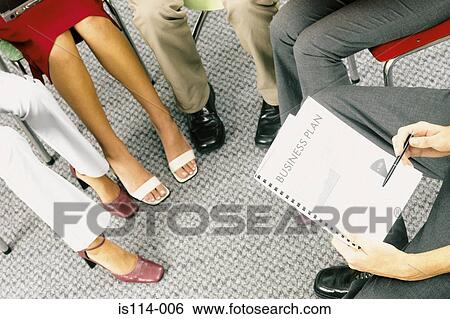 Stock Photograph - Businesspeople in meeting. Fotosearch