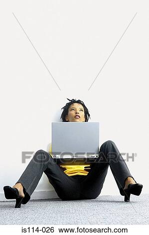 Businesswoman with laptop computer View Large Photo Image Stock Photograph - Businesswoman with laptop computer. Fotosearch