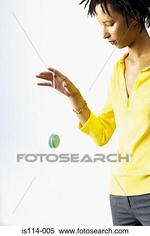 Businesswoman with yoyo View Large Photo Image Stock Photography - Businesswoman with yoyo. Fotosearch