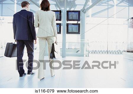 Business colleagues in airport terminal View Large Photo Image Stock Photo - Business colleagues in airport terminal. Fotosearch