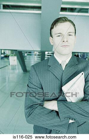 Businessman in airport terminal View Large Photo Image Stock Photography - Businessman in airport terminal. Fotosearch