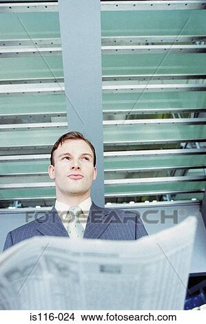 Businessman waiting in airport lounge View Large Photo Image Picture - Businessman waiting in airport lounge. Fotosearch