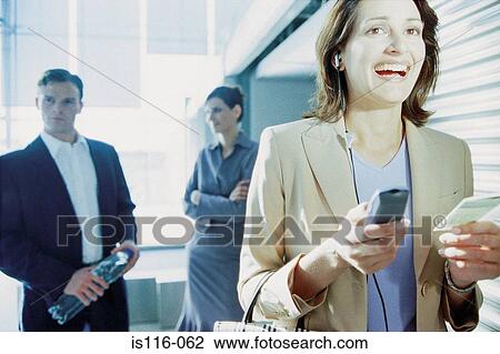 Businesswoman checking airline ticket View Large Photo Image Stock Image - Businesswoman checking airline ticket. Fotosearch