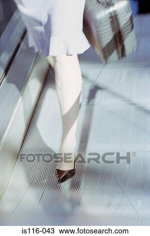 Businesswoman in airport terminal View Large Photo Image Stock Image - Businesswoman in airport terminal. Fotosearch