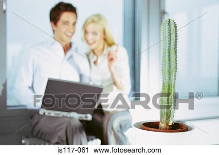 Businessman and businesswoman joking View Large Photo Image Stock Image - Businessman and businesswoman joking. Fotosearch
