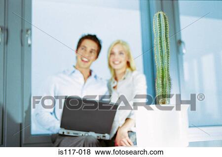 Businessman and businesswoman joking View Large Photo Image Stock Photo - Businessman and businesswoman joking. Fotosearch