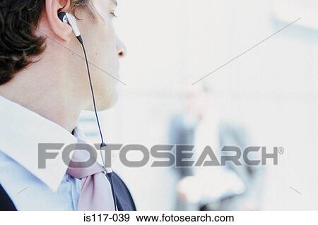 Stock Photo - Businessman with cellphone . Fotosearch
