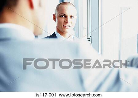 Stock Image - Businessmen meeting. Fotosearch