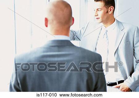 Businessmen meeting View Large Photo Image Stock Image - Businessmen meeting. Fotosearch