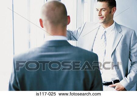 Businessmen meeting View Large Photo Image Stock Photography - Businessmen meeting. Fotosearch