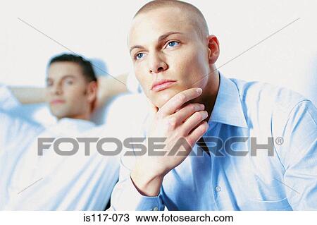 Stock Image - Businessmen relaxing. Fotosearch