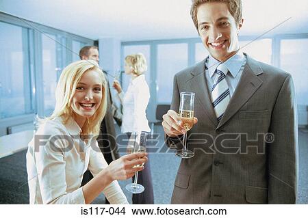 Businesspeople having office drinks View Large Photo Image Picture - Businesspeople having office drinks. Fotosearch