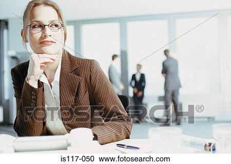 Businesswoman at desk View Large Photo Image Stock Image - Businesswoman at desk. Fotosearch