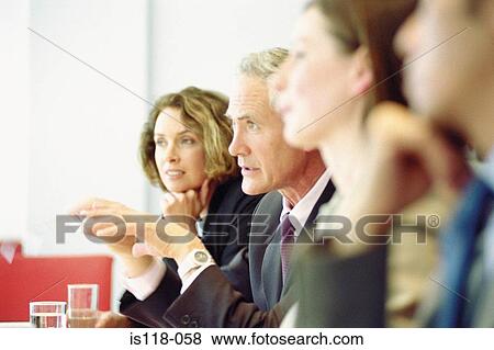 Standartinės nuotraukos - Businessman talking in meeting. Fotosearch