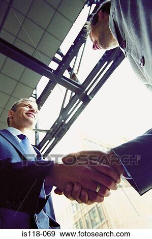 Businessmen shaking hands View Large Photo Image Stock Photo - Businessmen shaking hands. Fotosearch