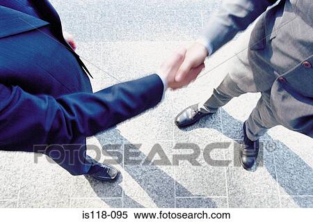 Businessmen shaking hands View Large Photo Image Stock Photography - Businessmen shaking hands. Fotosearch