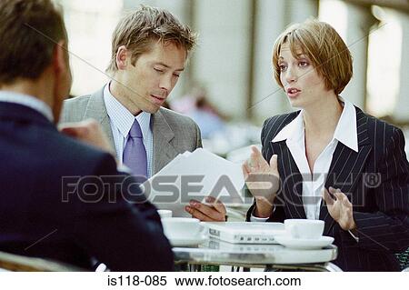 Businesspeople having meeting at cafe View Large Photo Image Stock Photography - Businesspeople having meeting at cafe. Fotosearch
