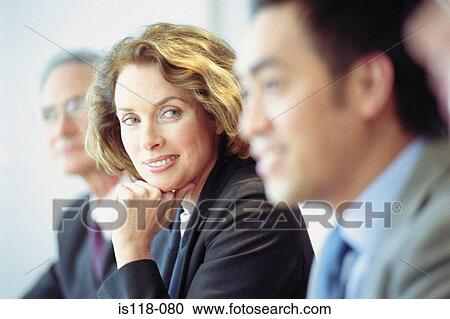 Businesspeople in meeting View Large Photo Image Stock Image - Businesspeople in meeting. Fotosearch
