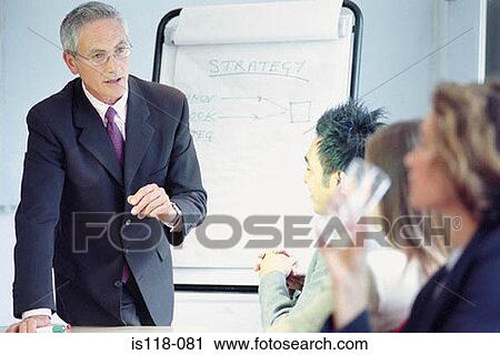 Businesspeople in meeting View Large Photo Image Stock Image - Businesspeople in meeting. Fotosearch