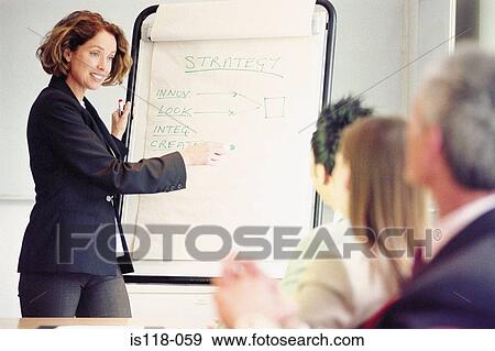 Stock Photo - Businesspeople in meeting. Fotosearch