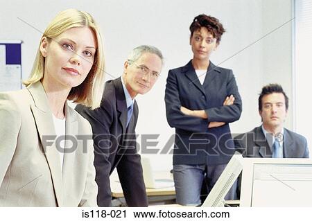 Businesspeople in office View Large Photo Image Stock Image - Businesspeople in office. Fotosearch