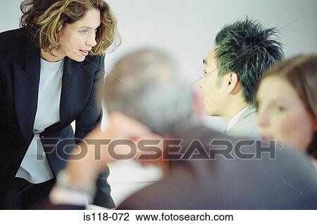 Businesspeople in office View Large Photo Image Stock Image - Businesspeople in office. Fotosearch