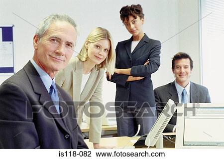 Stock Image - Businesspeople in office. Fotosearch