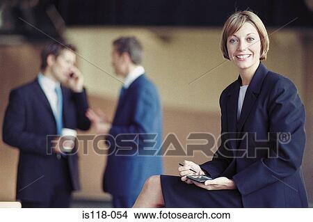 Picture - Businesspeople outside office. Fotosearch