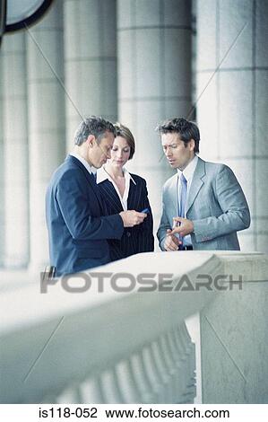 Businesspeople outside office View Large Photo Image Stock Image - Businesspeople outside office. Fotosearch