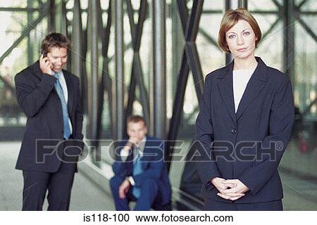 Stock Image - Businesspeople outside office. Fotosearch