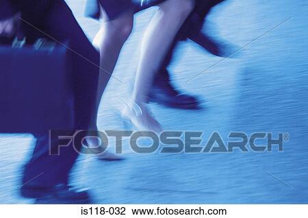Businesspeople walking briskly View Large Photo Image Stock Image - Businesspeople walking briskly. Fotosearch