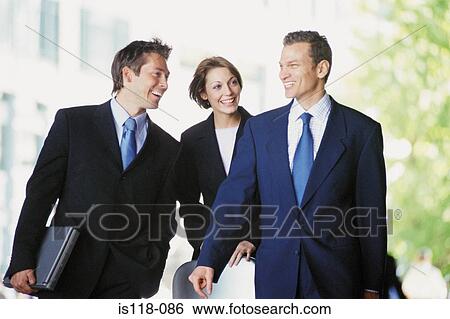 Stock Photograph - Businesspeople walking. Fotosearch