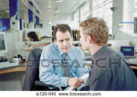 Businessmen in office View Large Photo Image Stock Photography - Businessmen in office. Fotosearch