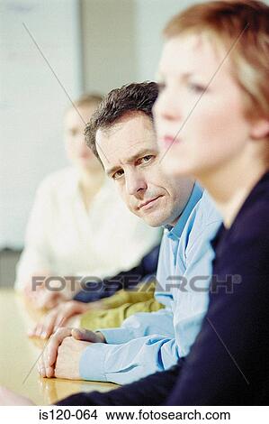 Businesspeople in office View Large Photo Image Picture - Businesspeople in office. Fotosearch