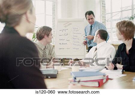 Businesspeople in office View Large Photo Image Stock Image - Businesspeople in office. Fotosearch