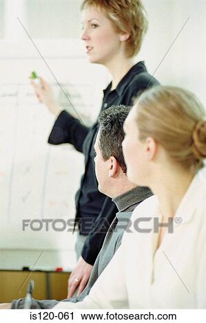 Stock Image - Businesspeople in office. Fotosearch