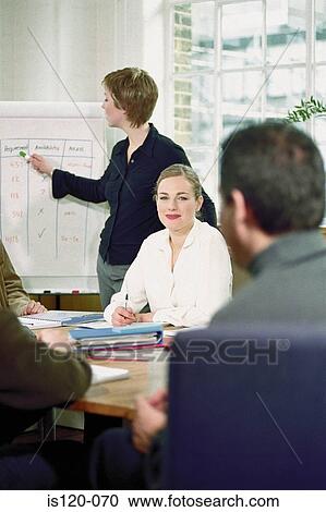 Stock Image - Businesspeople in office. Fotosearch
