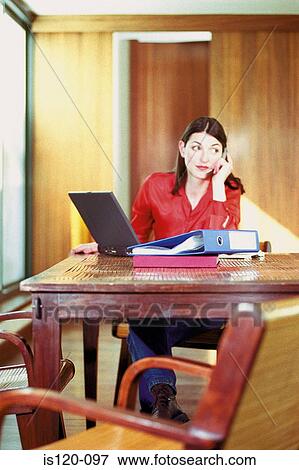 Woman working at home View Large Photo Image Stock Photo - Woman working at home. Fotosearch