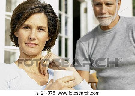 Stock Photograph - Man and woman outside. Fotosearch
