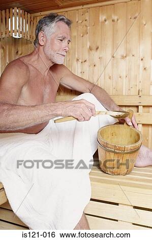 Stock Photograph - Man relaxing in sauna. Fotosearch