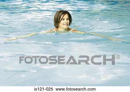 Stock Photography - Woman in swimming pool. Fotosearch