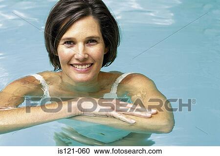 Stock Photography - Woman in swimming pool. Fotosearch - Search Stock Photos, Pictures, Wall Murals, Images, and Photo Clipart
