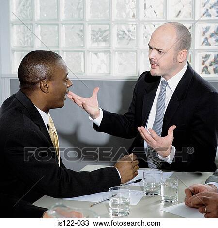 A heated meeting between two executives View Large Photo Image Stock Image - A heated meeting between two executives. Fotosearch